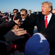 President Donald Trump shakes hands with supporters after arriving at Pittsburgh International Airport on Jan. 18, 2018. (Evan Vucci/AP Images)